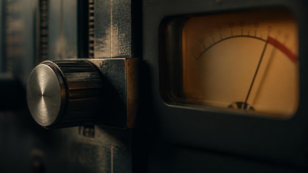 An analogue limiter dial with its needle pinned at a hard ceiling